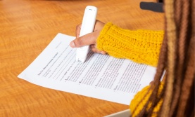 Student using a text to speech pen
