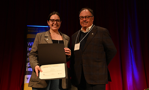 A person and person holding a piece of paper.