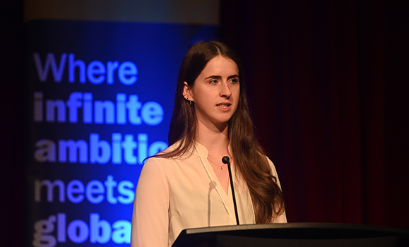 A person standing at a podium