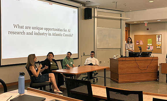 Panel speakers talking at the A2I2 launch