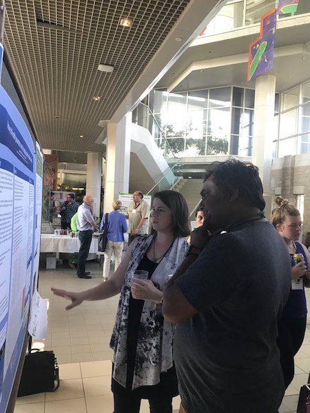 Dr. Carolyn Marshall discussing her poster