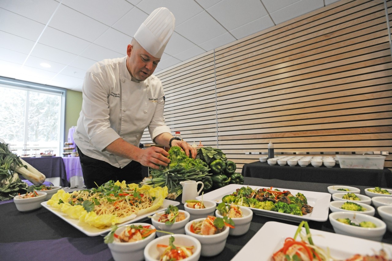 Chef Mike Silvester, preparing a catering display.