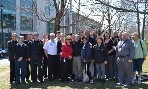 Facilities management group standing outside