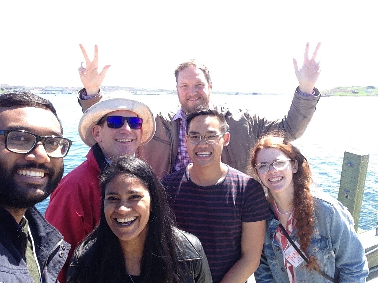 Ren, colleagues, alumni and students on the Halifax waterfront