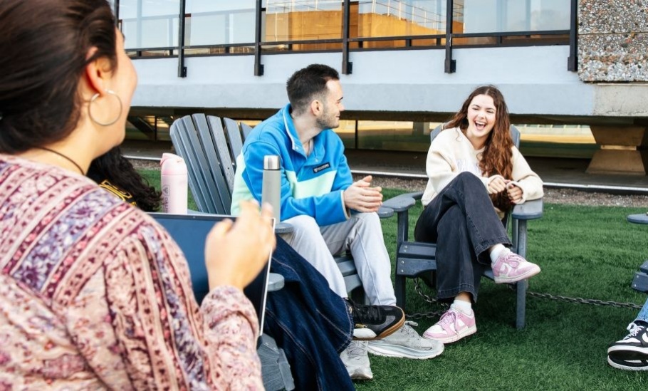 group-students-outside-library-chatting-fass01