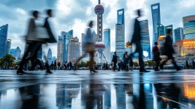 Blurred business people walking in cityscape