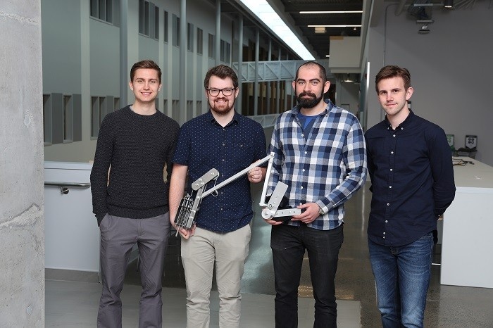 The Capstone Team behind the biomechanical arm assist.