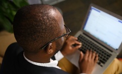 overhead of person working on laptop