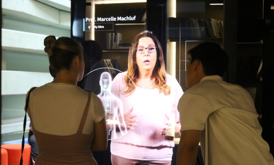 Students engaging with virtual display at the Peres Center for Peace and Innovation in Tel Aviv