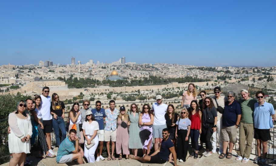 Group photo of 2022 Program Participants on Mt. Scopus overlooking the Dome of the Rock and Jerusalem