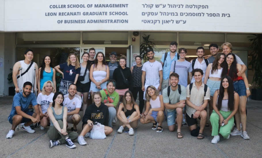 Group photo in front of Tel Aviv University's Coller School of Management