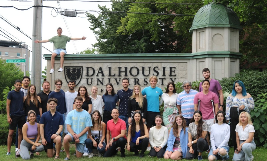 Group photo of 2022 Program Participants in front of the Dalhousie University sign on University Avenue