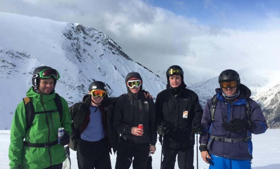 Five skiers in the Alps