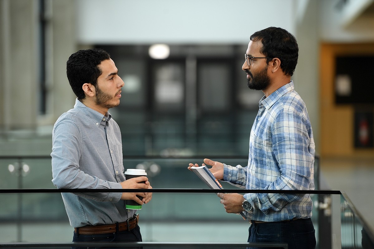 ELS instructor chatting with student