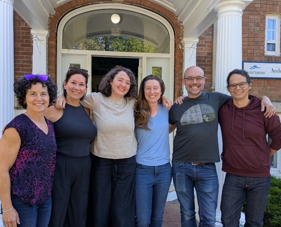 MAP faculty and staff share a smile