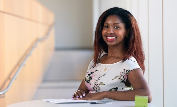 Keisha Jeffries sitting at a desk