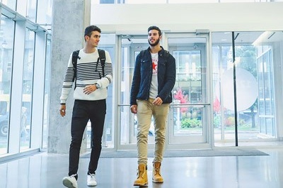 Students walking inside a building