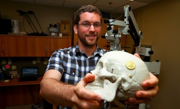 Rob Adamson shows off a prototype of his team's new hearing aid device. (Bruce Bottomley) Rob Adamson shows off a prototype of his team's new hearing aid device. (Bruce Bottomley)