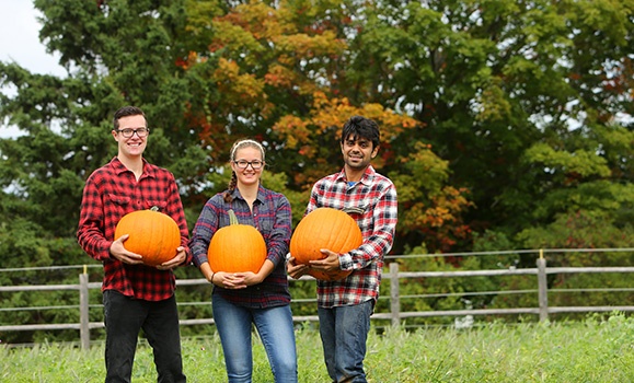 Dal students and some of the more typically sized pumpkins on the Ag Campus. (Nick Pearce photo) Dal students and some of the more typically sized pumpkins on the Ag Campus. (Nick Pearce photo)