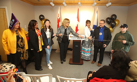 Bob Gloade, chief of Millbrook First Nation (second from right), and Karen Pictou, executive director of Nova Scotia Native Women's Association (third from right), cut the ribbon at an opening ceremony Wednesday. (Nick Pearce photos) Bob Gloade, chief of Millbrook First Nation (second from right), and Karen Pictou, executive director of Nova Scotia Native Women's Association (third from right), cut the ribbon at an opening ceremony Wednesday. (Nick Pearce photos)