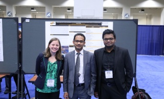 Siobhan, Dr. Habib, and Nazmul present a poster Siobhan, Dr. Habib, and Nazmul present a poster