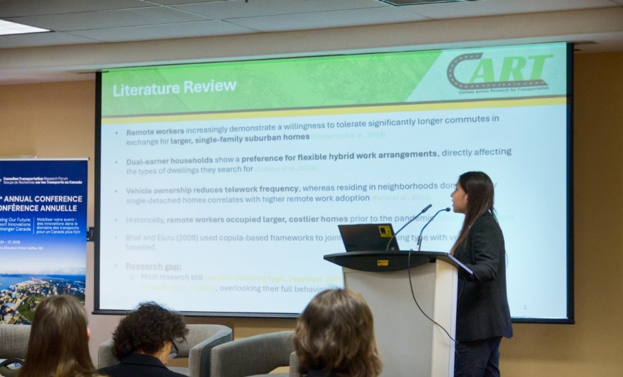 Fatin giving a slideshow presentation to attendees of the 2026 CTRF conference in Halifax