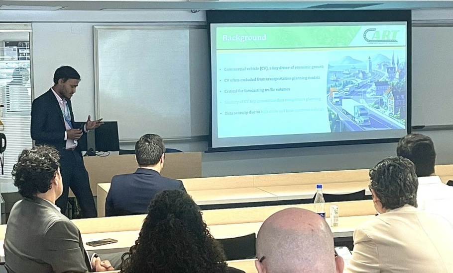 A man giving a presentation at a conference