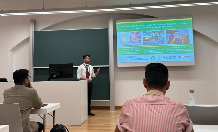 A man giving a presentation at a conference