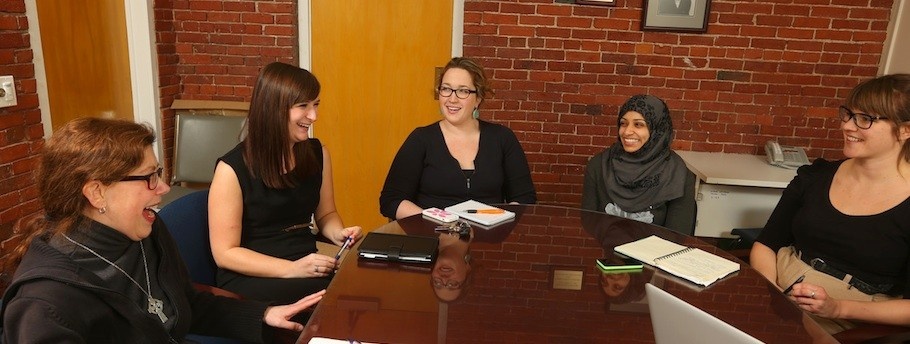 Nursing students meet to discuss thesis work